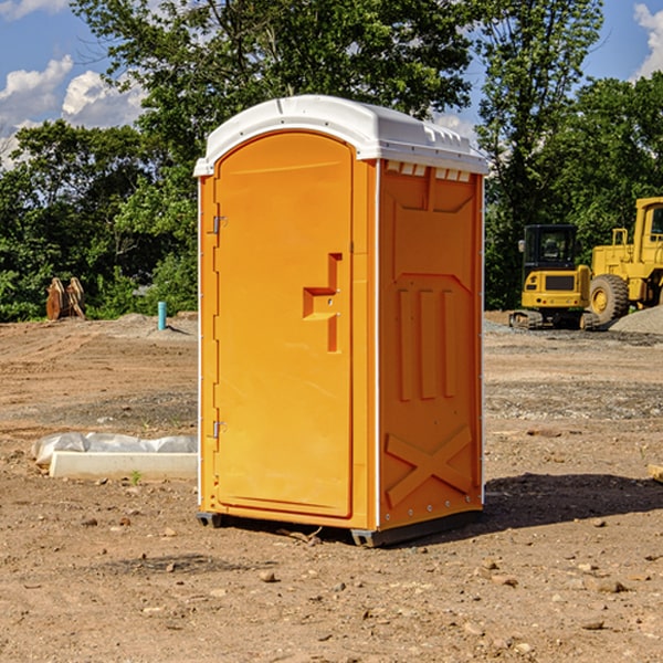 how often are the portable restrooms cleaned and serviced during a rental period in Winnie